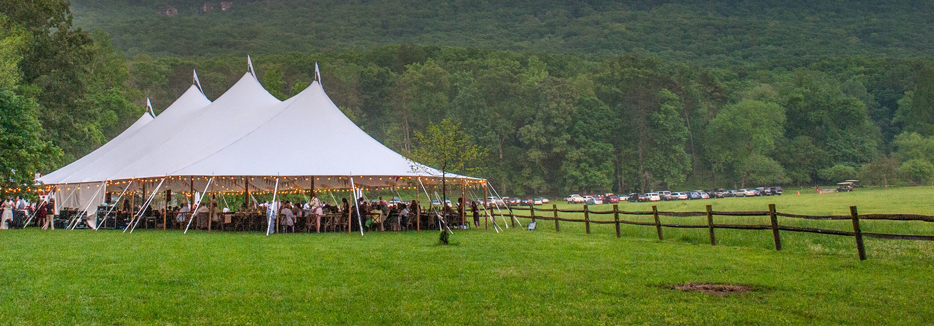 If you're looking for tent companies near me, Chattanooga Tent can help! This high peak tent was the perfect touch for this Chattanooga event.