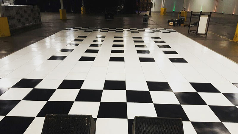 Tent manufacturers showing dance floor for upcoming event.